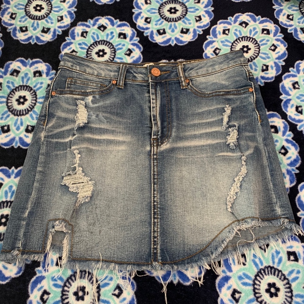 Distressed blue jean skirt